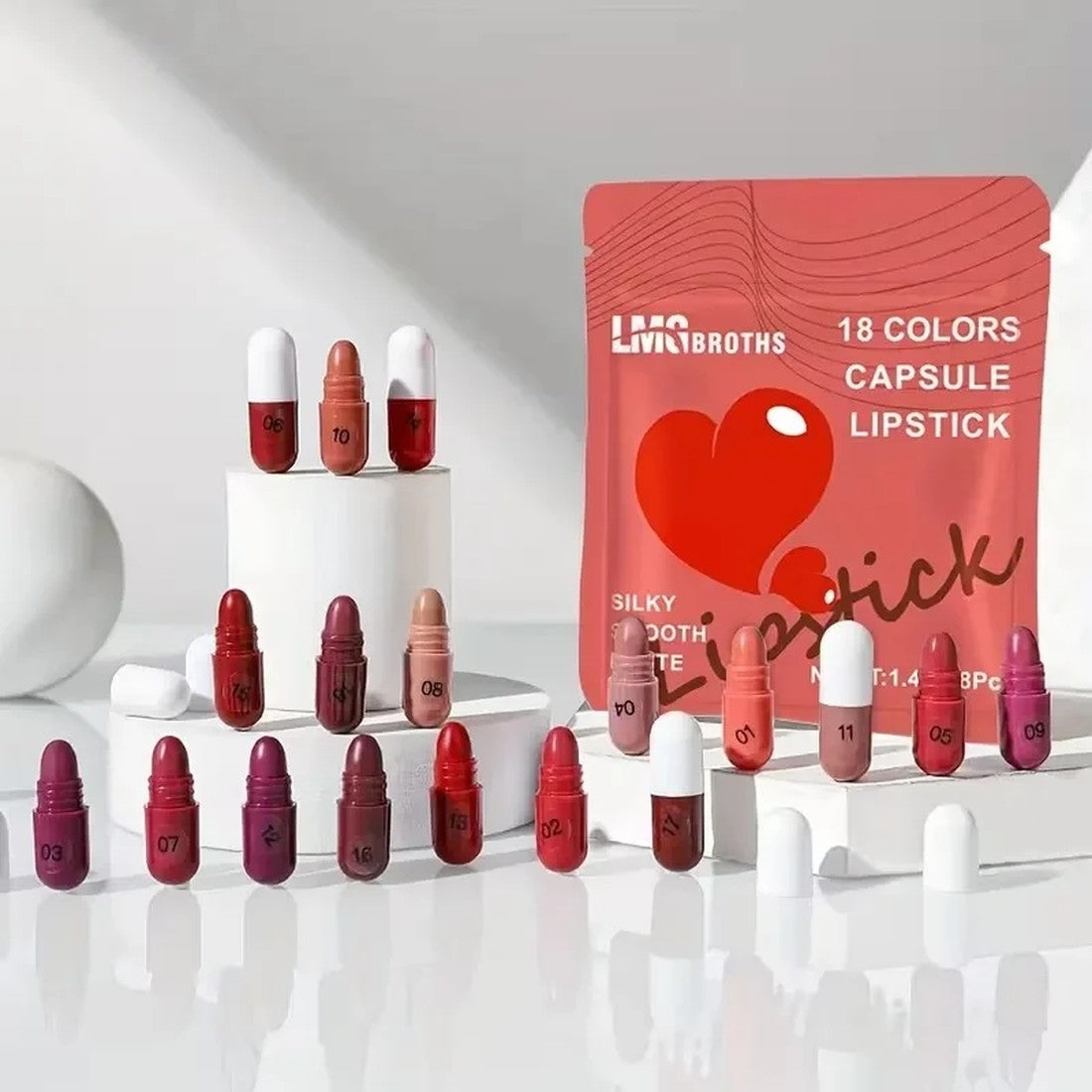 Linsbroths 18 Colors Capsule Lipstick Set - Silky Smooth Matte Mini Lipsticks (1.4g x 18 Pcs) - Buy Online in Pakistan at Cosmia.pk - red pouch studio shot with full capsule shade lineup