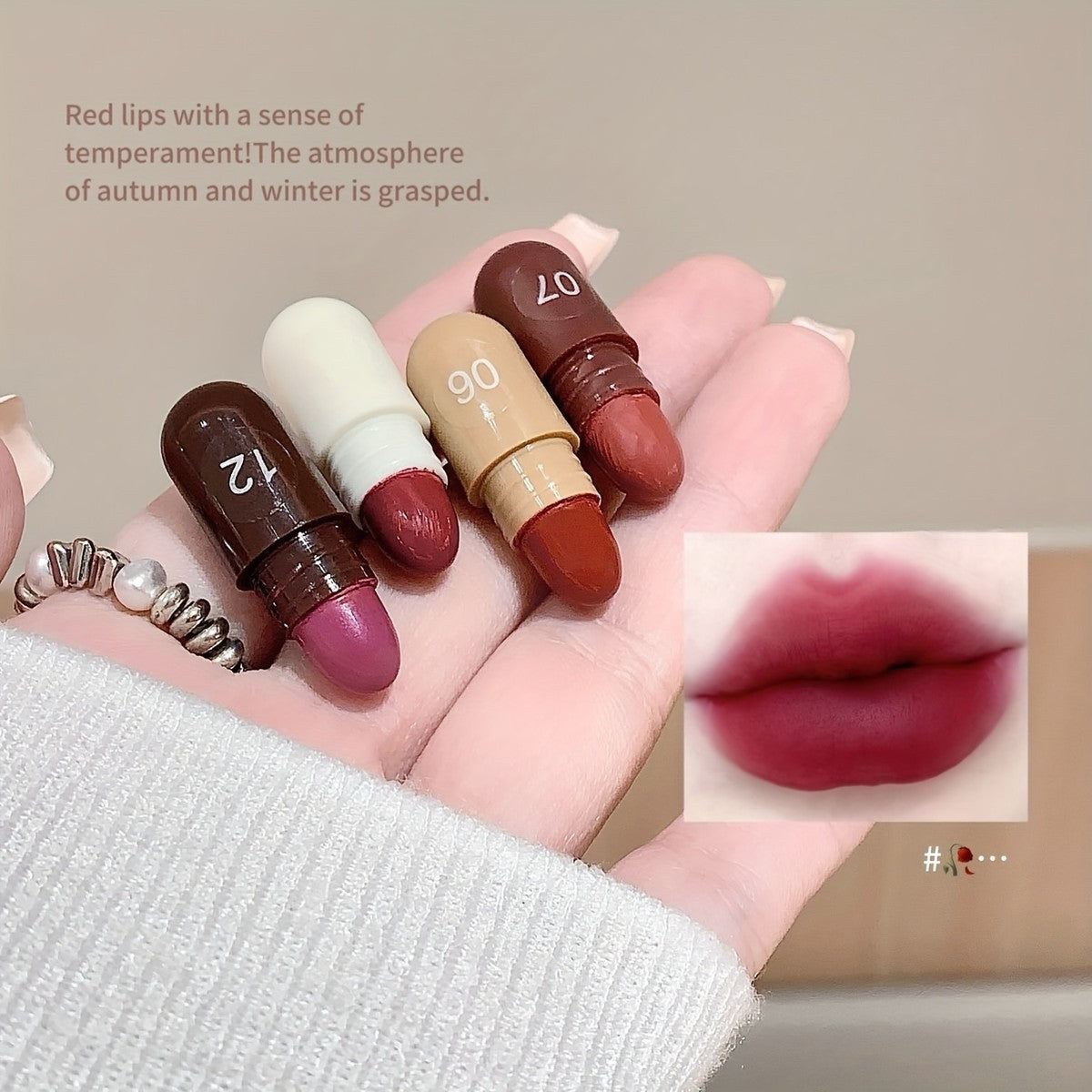 KS One Chocolate Lipstick Set - 12 Colors Mini Capsule Lipsticks, Silky Smooth (Treasure Mini Lipstick) - Buy Online in Pakistan at Cosmia.pk - hand holding four chocolate capsule lipsticks with lip swatch