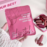 Magic Casa 12 Colors Mini Bag Lipstick Set - Silky Smooth Matte Capsule Lipsticks, Pink Pouch - Buy Online in Pakistan at Cosmia.pk - pink pouch held in hand with capsule lipsticks on a mirror tray