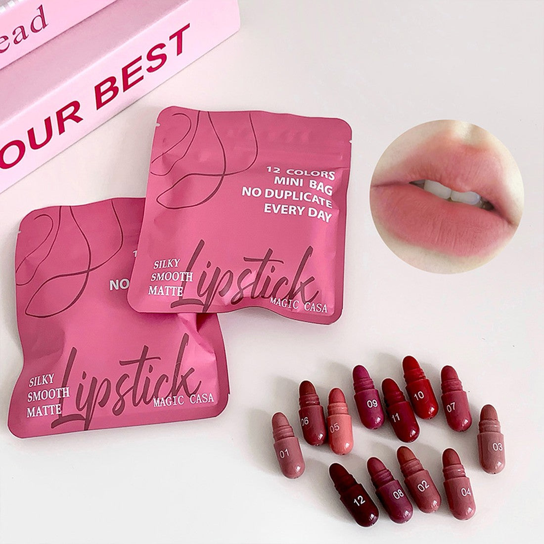 Magic Casa 12 Colors Mini Bag Lipstick Set - Silky Smooth Matte Capsule Lipsticks, Pink Pouch - Buy Online in Pakistan at Cosmia.pk - two pink pouches with numbered capsule lipsticks and lip swatch