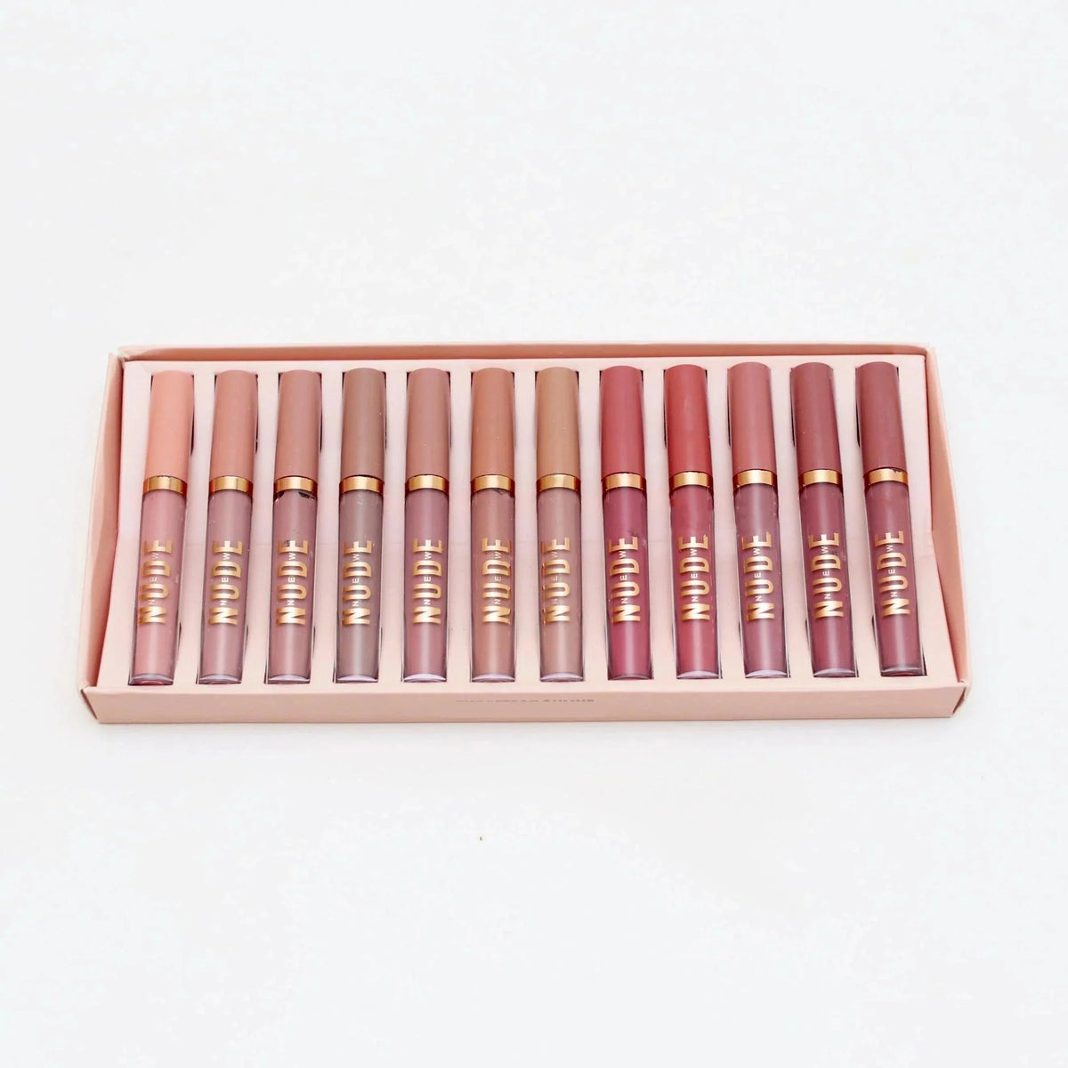 Nude Lip Gloss - Pack of 12 - Buy Online in Pakistan at Cosmia.pk