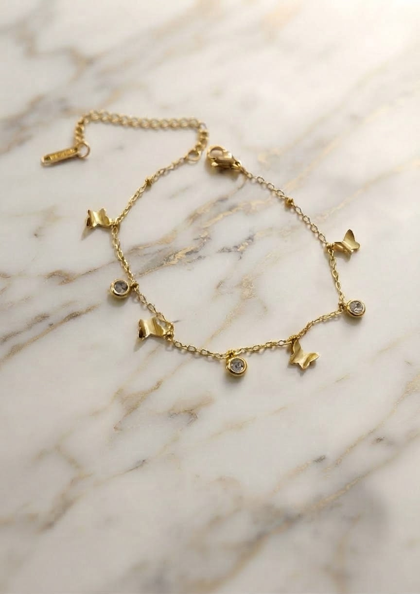 316L Stainless Steel Butterfly Charm Bracelet in gold with butterfly and crystal charms - view 1 - buy online in Pakistan at Cosmia.pk
