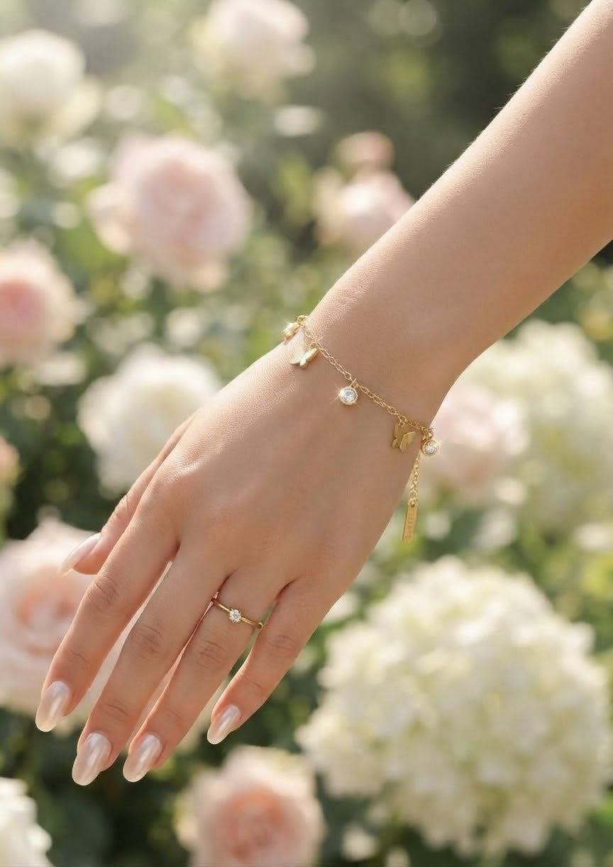 316L Stainless Steel Butterfly Charm Bracelet in gold with butterfly and crystal charms - view 5 - buy online in Pakistan at Cosmia.pk
