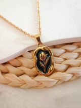 316L Stainless Steel Tulip Flower Pendant Necklace - Black enamel version, black enamel tulip pendant detail on woven rattan - buy online in Pakistan at Cosmia.pk