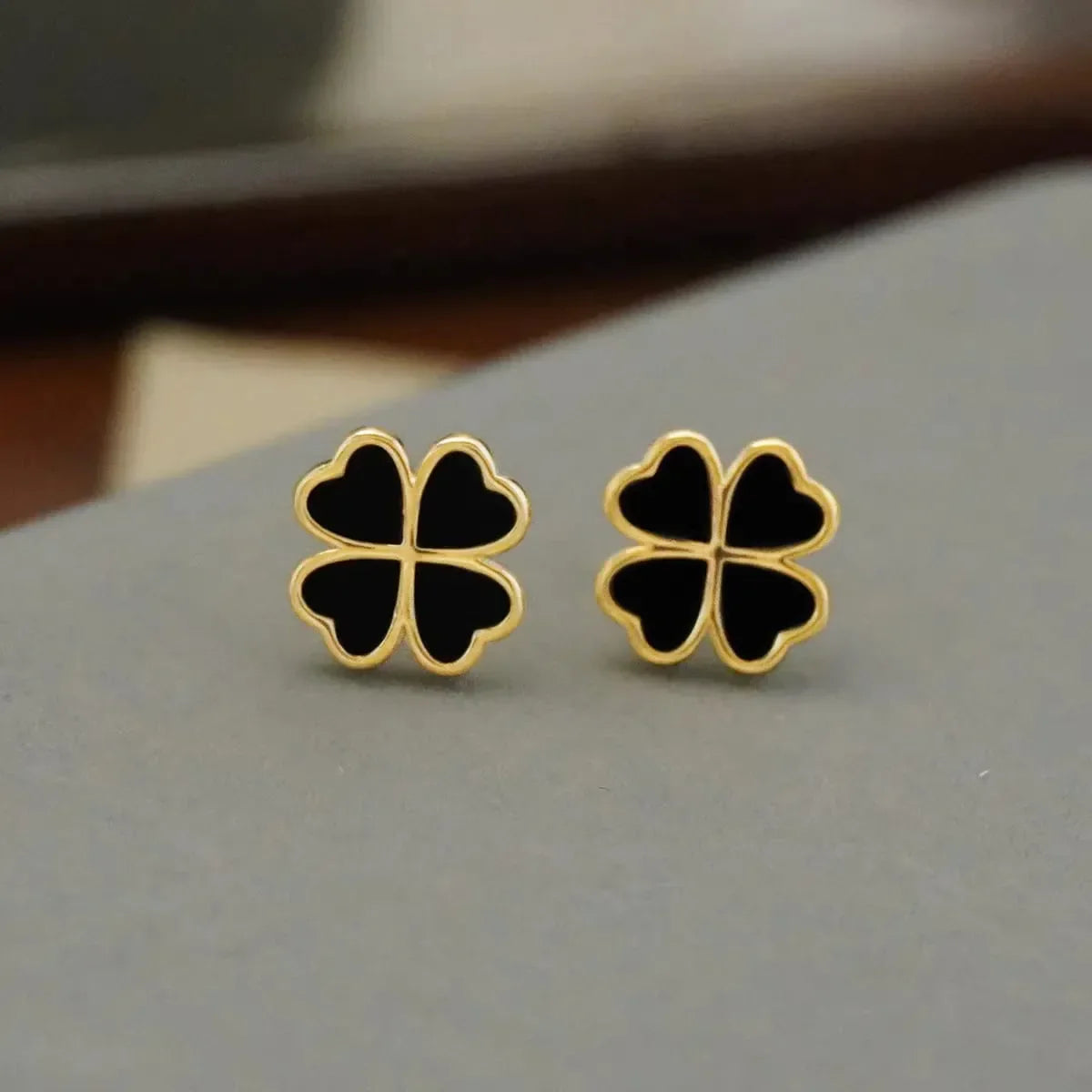 Black Four-Leaf Clover Earrings - Buy Online in Pakistan at Cosmia.pk