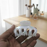 Plastic Hair Claw Clips In Assorted Pastel Colors - Buy Online in Pakistan at Cosmia.pk