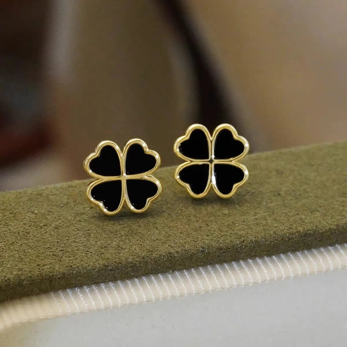 Black Four-Leaf Clover Earrings - Buy Online in Pakistan at Cosmia.pk
