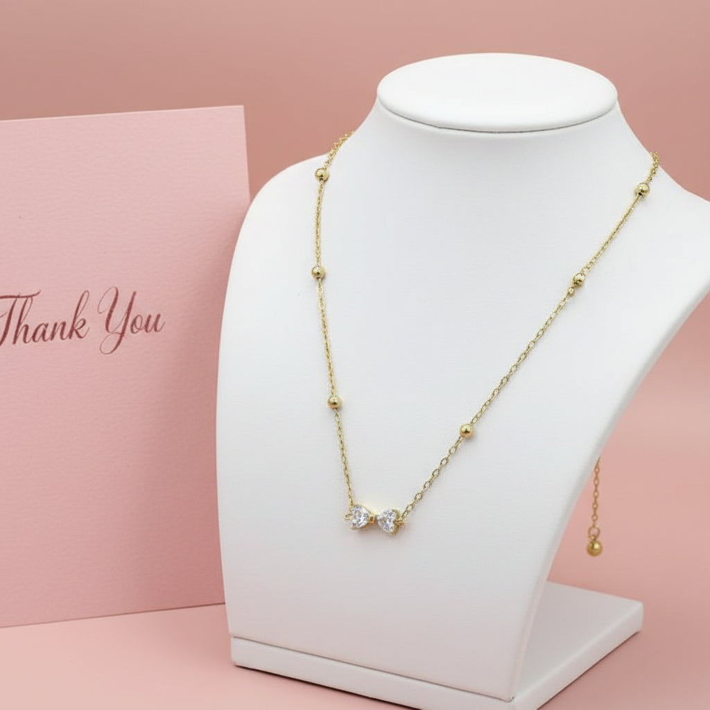 Stainless Steel Bow Zircon Necklace - Buy Online in Pakistan at Cosmia.pk