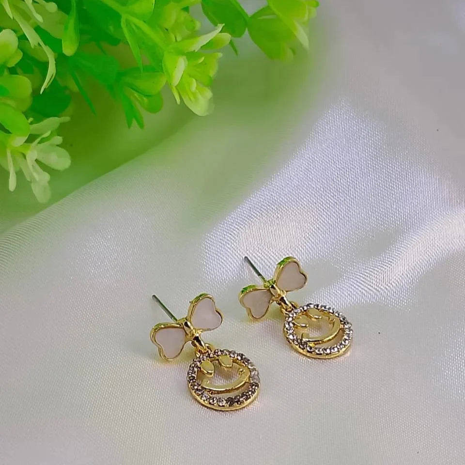 Elegant Bow Hollow Circle Drop Earrings – Each - Buy Online in Pakistan at Cosmia.pk