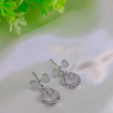 Elegant Bow Hollow Circle Drop Earrings – Each - Buy Online in Pakistan at Cosmia.pk