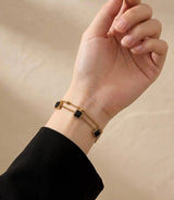 Black crystal cube charm bracelet on wrist