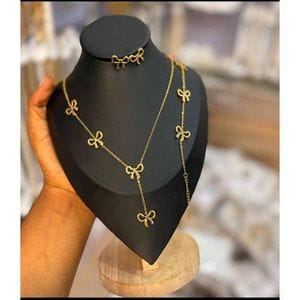 Gold bowknot jewelry set - bow necklace with matching bracelet and stud earrings