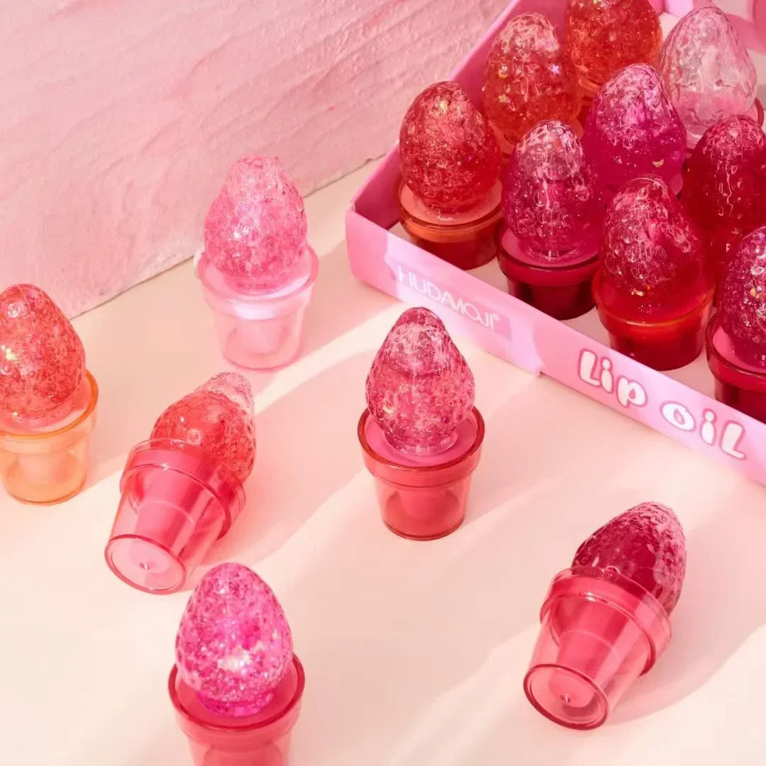 Huda Moji Strawberry Magic Lip Gloss - Buy Online in Pakistan at Cosmia.pk