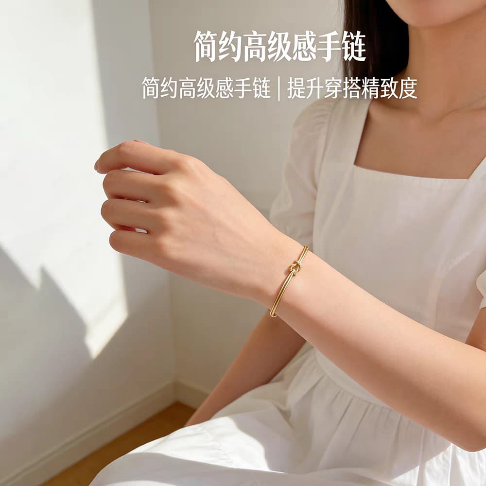 316L Stainless Steel Gold Love Knot Double Snake Chain Bracelet for Women - worn on wrist