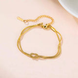 316L Stainless Steel Gold Love Knot Double Snake Chain Bracelet - flat lay with lobster clasp