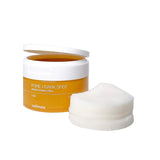 Celimax Pore + Dark Spot Brightening Pad open jar with pads — Cosmia.pk