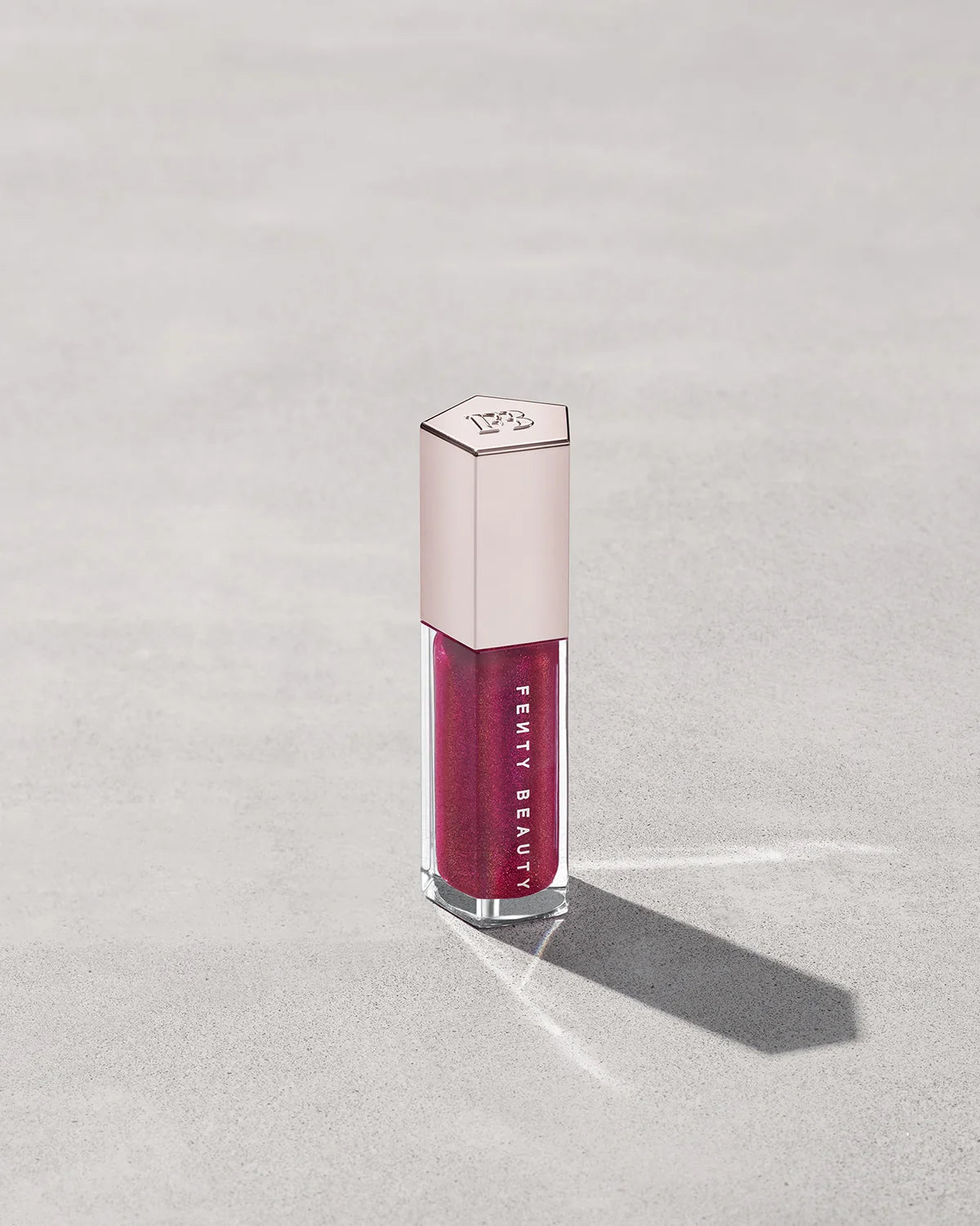 Fenty Beauty Gloss Bomb Universal Lip Luminizer shade Fuchsia Flex 12 (vivid fuchsia shimmer) 9ml - buy online in Pakistan at Cosmia.pk
