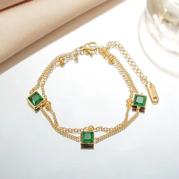 Green crystal cube charm bracelet with lobster clasp and extender