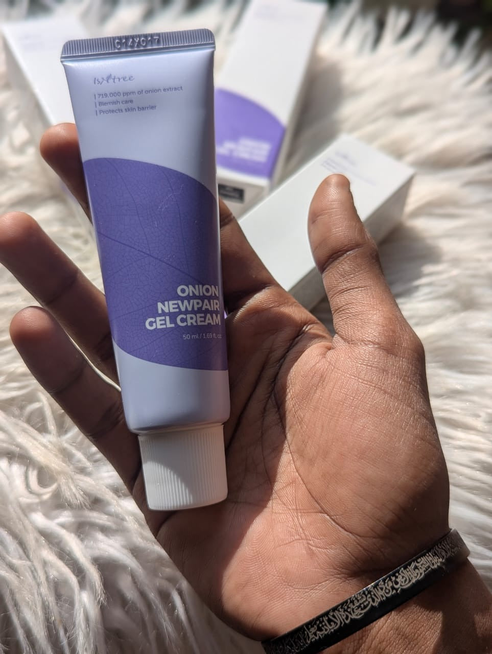 Isntree Onion Newpair Gel Cream 50ml in hand - real product photo