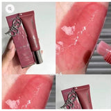 Olibolla Vitamin E Lip Glow Butter tube and box with lip swatches