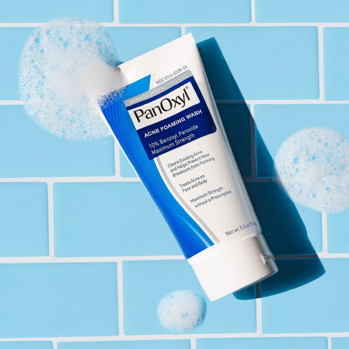 PanOxyl Acne Foaming Wash 10% Benzoyl Peroxide 156g – tube with foam lifestyle shot