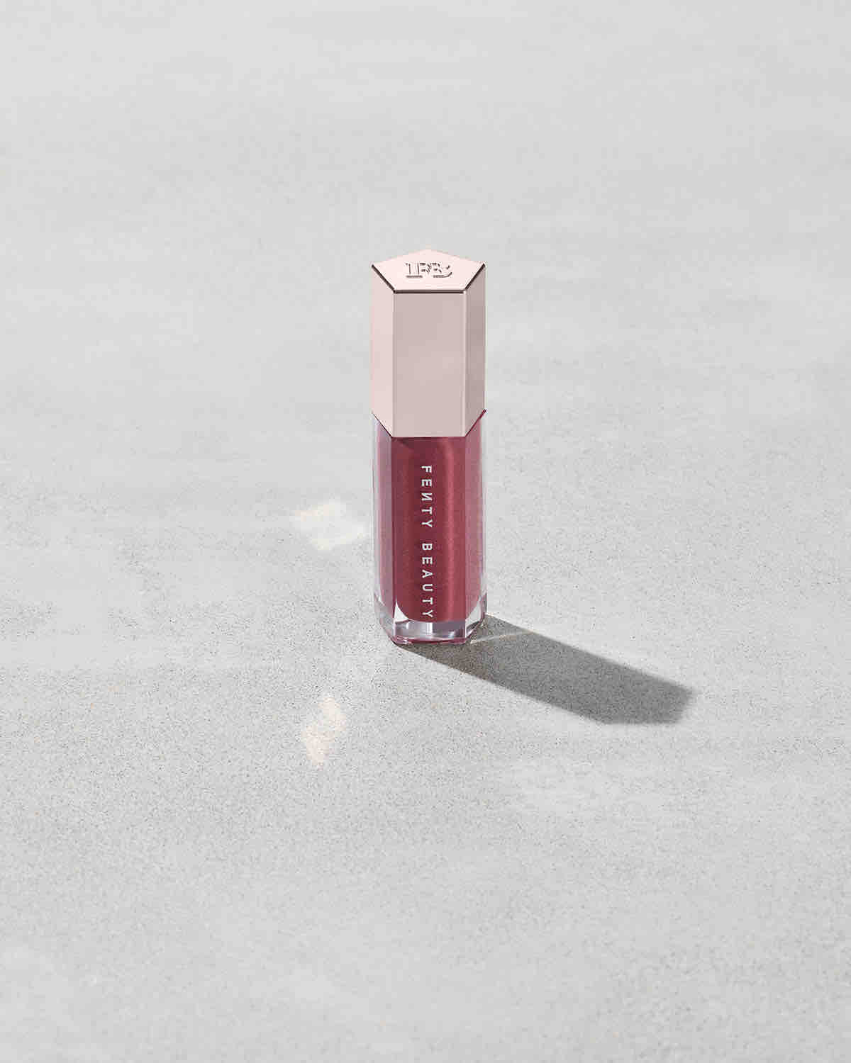 Fenty Beauty Gloss Bomb Universal Lip Luminizer shade Riri 08 (shimmering mauve nude) 9ml - buy online in Pakistan at Cosmia.pk