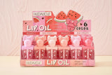 Huda Moji Watermelon Popsicle Ice cream Color Changing Lip Gloss - Buy Online in Pakistan at Cosmia.pk