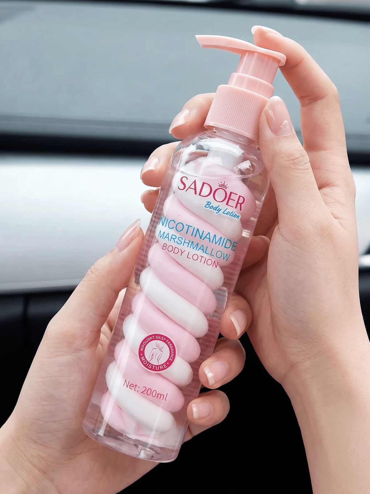 SADOER Nicotinamide Marshmallow Body Lotion held in hand — 200ml body care Pakistan
