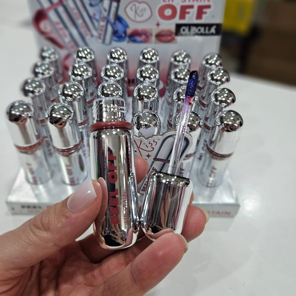 Olibolla Peel Off Lip Stain in hand with retail display stand