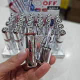 Olibolla Peel Off Lip Stain in hand with retail display stand