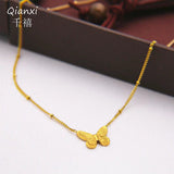 Stainless steel golden butterfly pendant necklace for women - buy online in Pakistan at Cosmia.pk (photo 1 of 5)