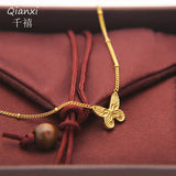 Stainless steel golden butterfly pendant necklace for women - buy online in Pakistan at Cosmia.pk (photo 2 of 5)