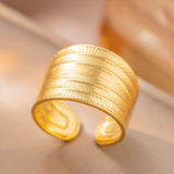 Stainless Steel Textured Wide Thick Golden Open Ring close-up texture detail - buy online in Pakistan at Cosmia.pk